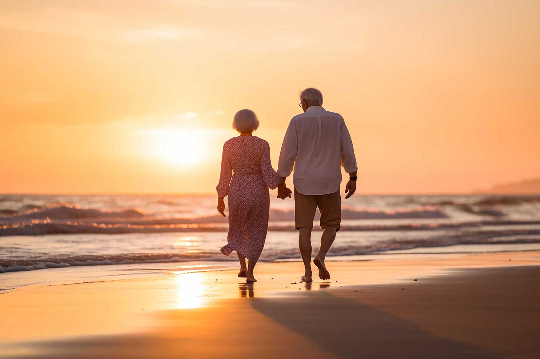 couple walking into sunset